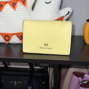 Jet Set MK wallet in Yellow